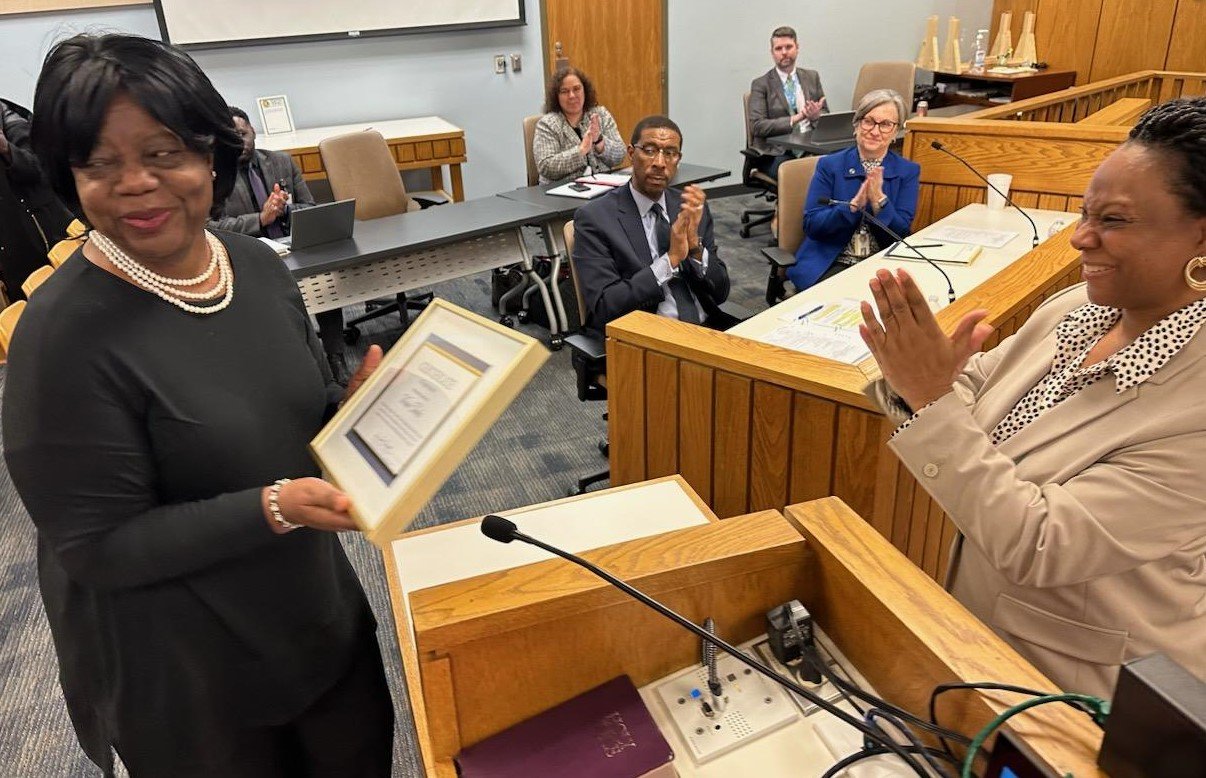 In recognition of Women's History Month, Cumberland County Board of Commissioners Chairwoman Toni Stewart, right, recognized Vivian Tookes, left, the longest-serving county employee, on Monday night. Tookes has been with the Department of Social Services since Oct. 1, 1982.