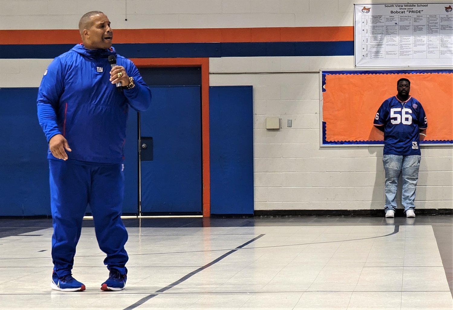 Former NFL player and now inspirational speaker Keith Davis speaks to South View Middle School students on Wednesday in Hope Mills. The title of Davis’ speech was 'PUSH', an acronym for Persevere Until Success Happens