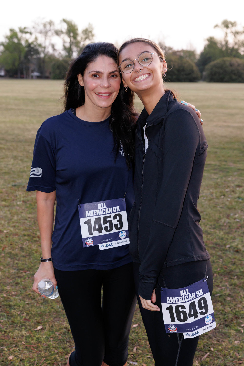 Mother and daughter Cristina Crespo and Janessa Jackson await the start of the All American Races on  Fort Bragg on March 25, 2023.   Tony Wooten/CityView Media