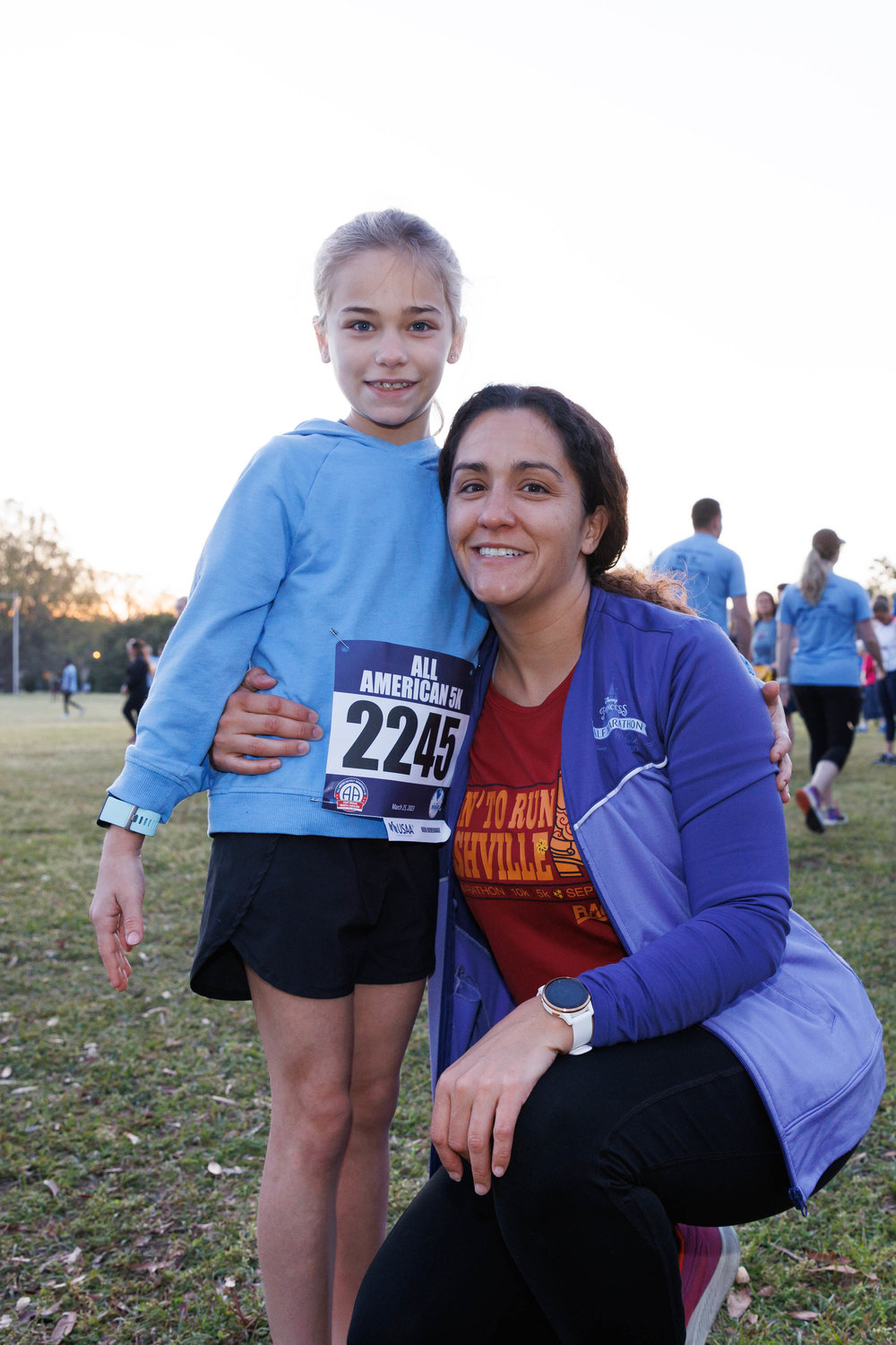 Meagan Pitts and her daughter Abigail pose for a portrait before the start of the All American Races on  Fort Bragg on March 25, 2023.  Tony Wooten/CityView Media