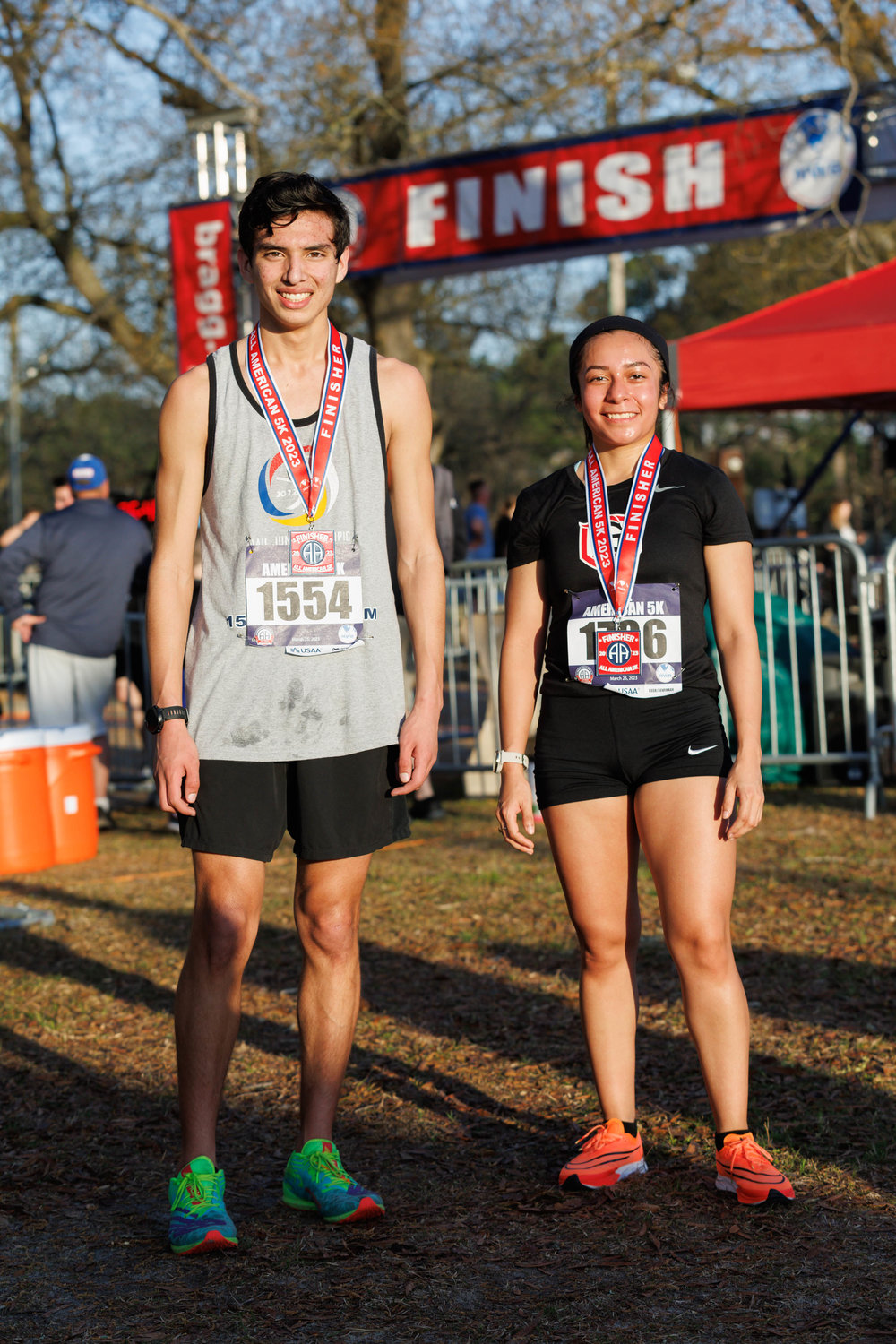 Bradley Garcia and Yarency Murillo pose for a portrait as the first male and female finishers of the 5K All American Race on March 23, 2023.  Tony Wooten/CityView Media
