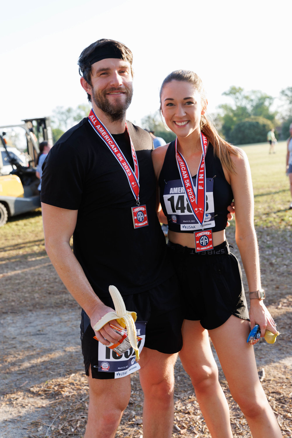 Daniel Pew and Kari Dibble pose for a portrait after completing the All American Race on Fort Bragg on March 23, 2023.  Tony Wooten/CityView Media
