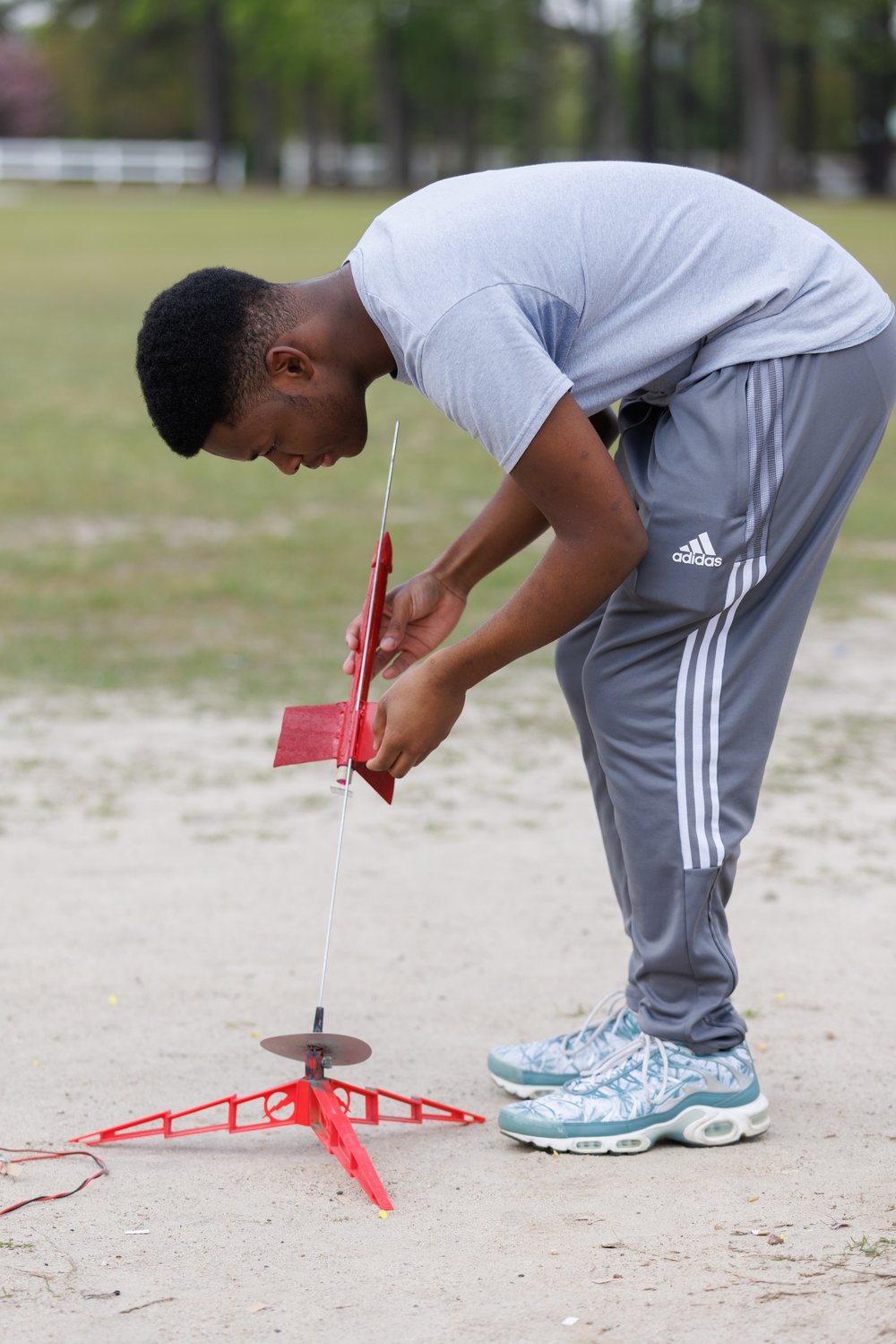 A STEM student sets up a rocket for launch at Seventy-First Classical Middle School Wednesday.