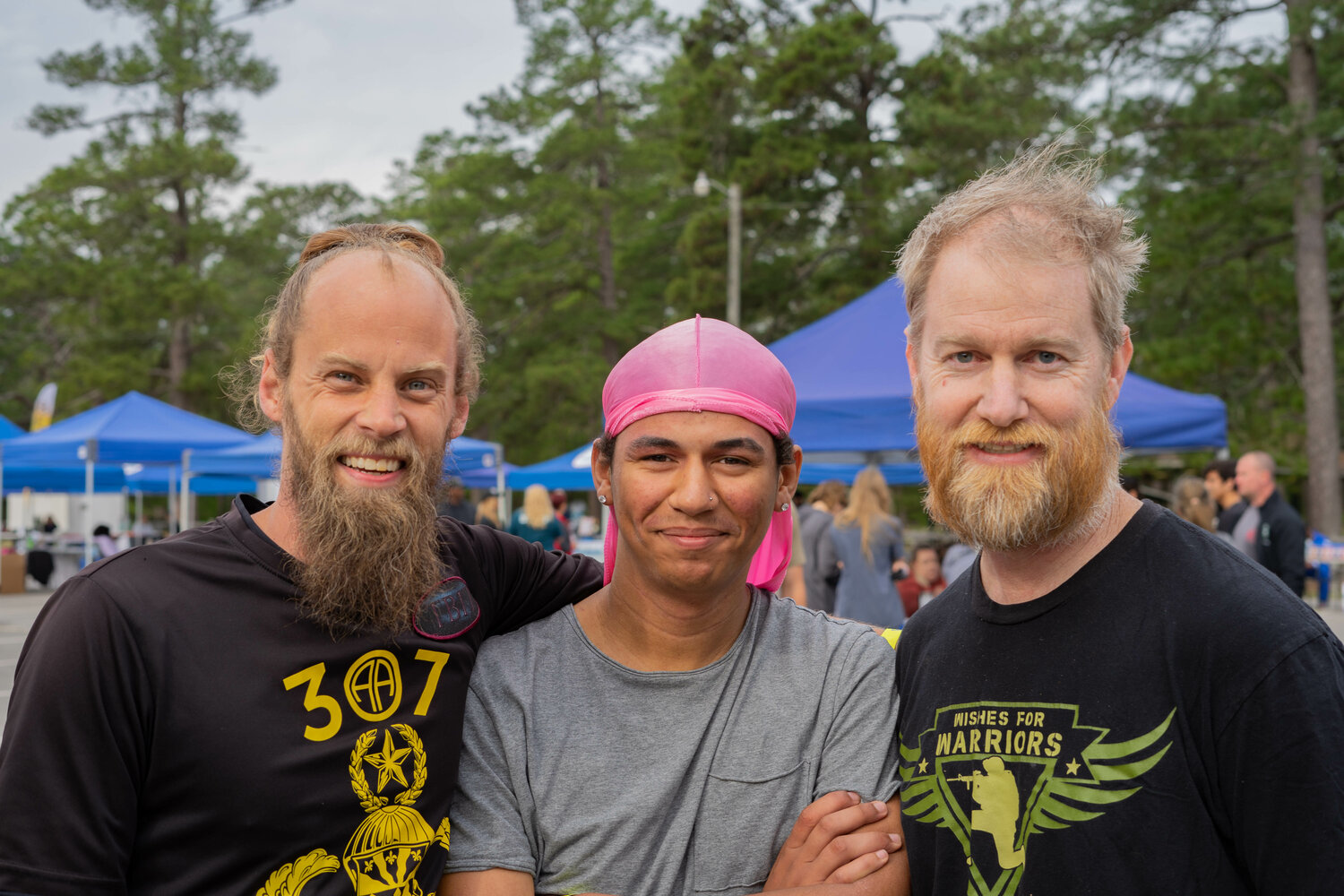 Retired Staff Sgt. John Bender, Ji’sean Weber and retired Staff Sgt. Anthony Jobes participate in Fort Bragg's Mud Run on April 22 at McKellar's Lodge.