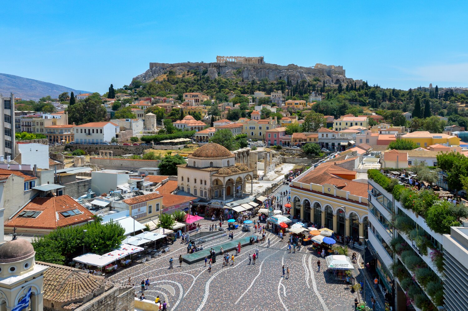 The large shopping agora called Monastiraki is a few blocks away from the Parthenon and Acropolis in the neighborhood of Theseio, where the Kalogerinis family stays. Photo by Starcevic via Canva