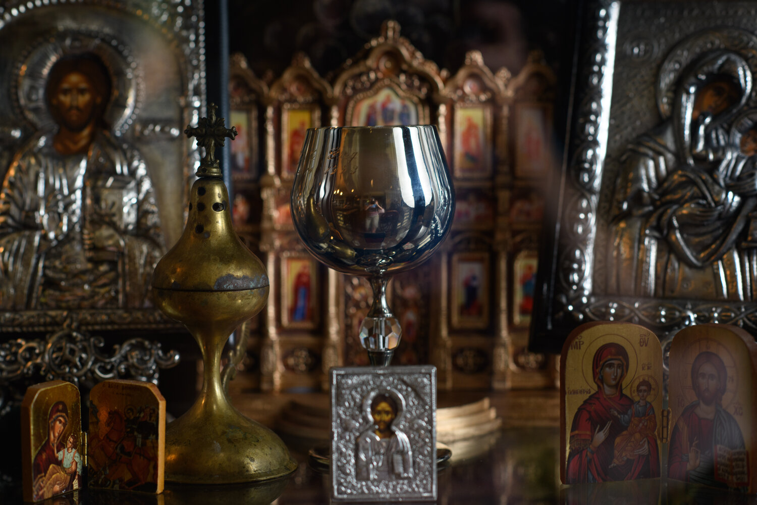 a goblet from Greg and Effie Kalevases’ wedding is on display with iconography from Greece at her family’s home in Fayetteville.