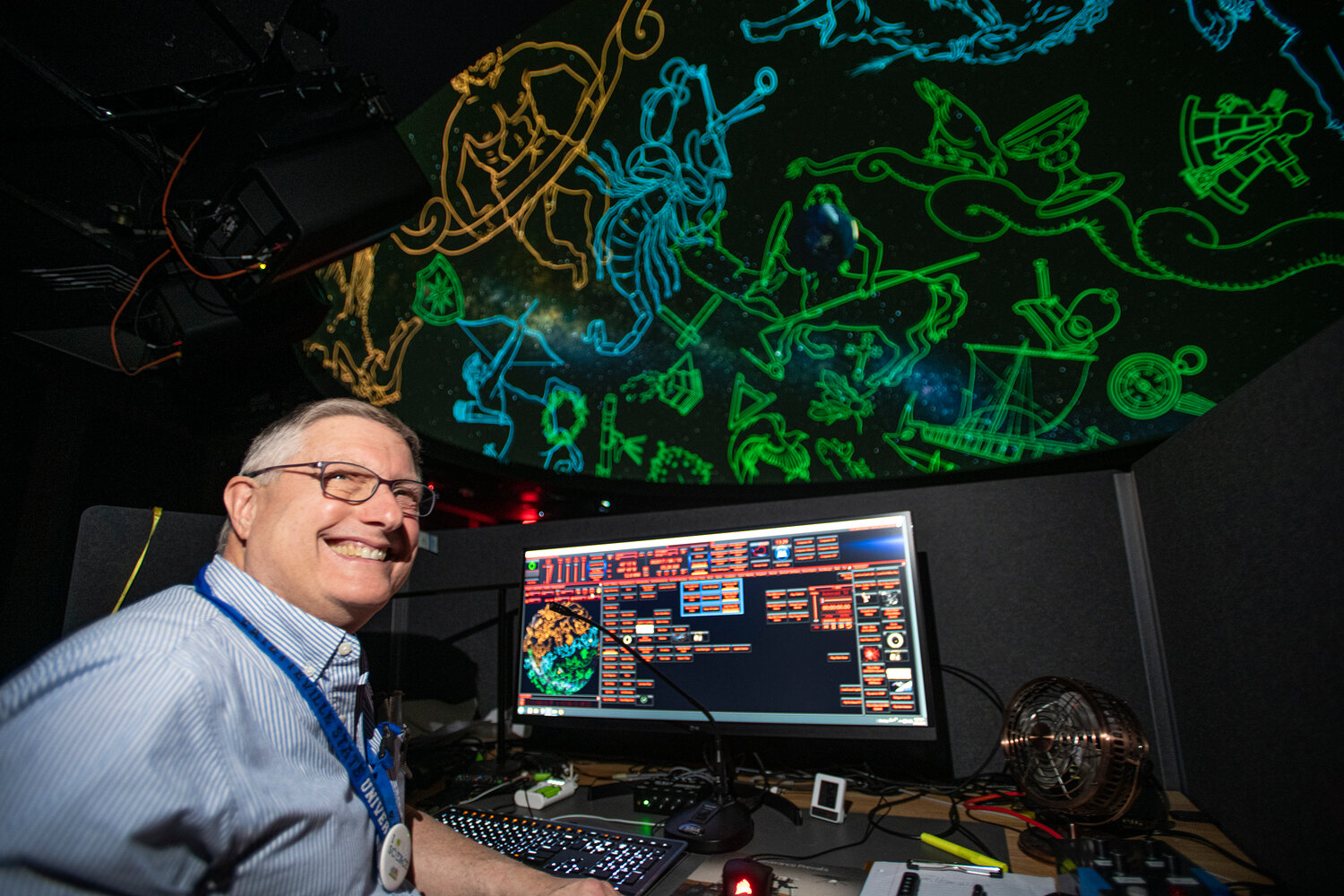 At a master control unit that would make “Star Trek” navigator Sulu proud, Kabbes pushes buttons that project different views of the universe, such as how the Earth would look from the dark side of Jupiter or a panoramic view of the constellations.