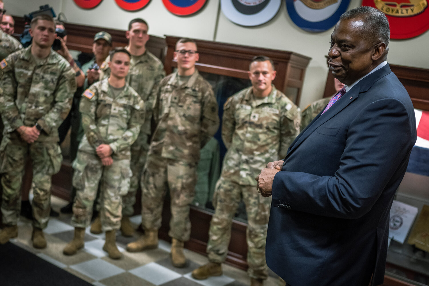 Secretary of Defense Lloyd J. Austin III speaks with soldiers assigned to the 18th Airborne Corps during a visit to Fort Bragg on Friday.
