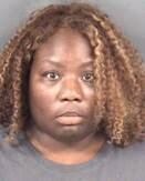 Lakisha Renee Davis, 46, is charged with taking indecent liberties with a student and felonious restraint.