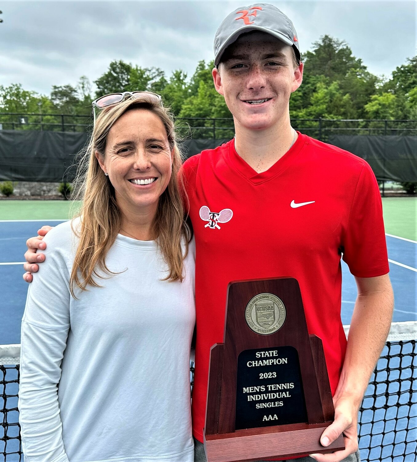 Drew Hedgecoe and his mother, Claire Cheatwood Hedgecoe, share a love of tennis. He the state 3-A boys singles tennis championship for Terry Sanford recently; she won a doubles state title with Elizabeth Williams in 1993.