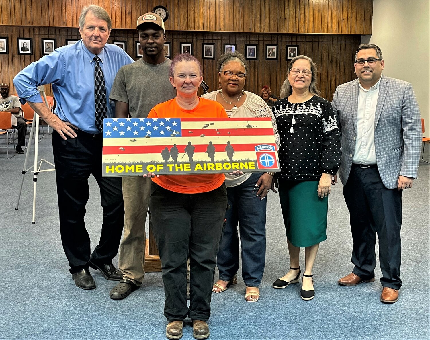 A mural showing support for the military will be the subject of a mural on Main Street in Spring Lake. From left are David Dickerhoff;; William Bryant; town Stormwater Administrator Deanna Rosario; committee Chair Fredricka Sutherland; Vice Chair Cynthia Wilt, and Alderman Raul Palacio
