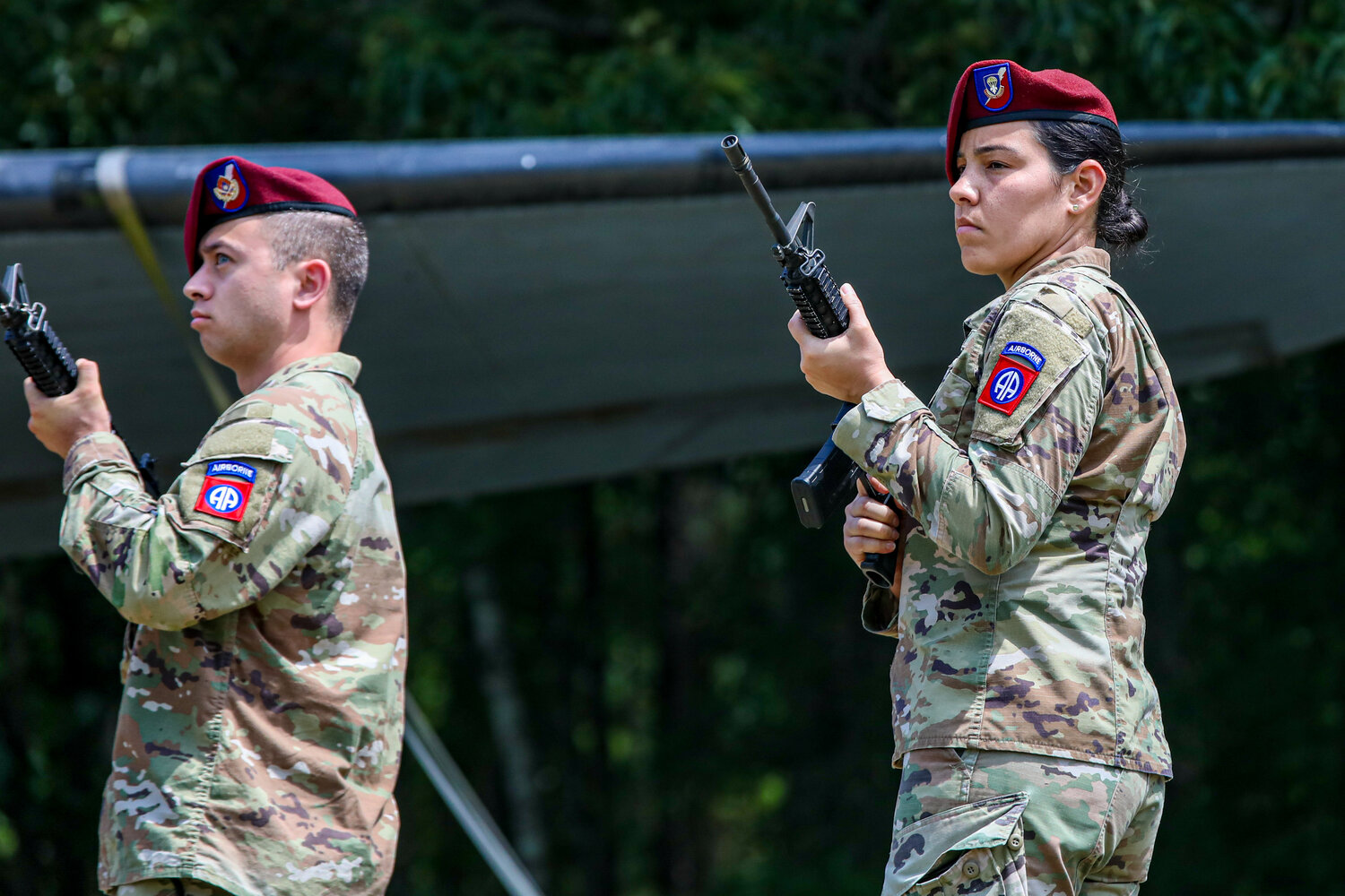 Paratroopers assigned to the 82nd Airborne Division render the 21-gun salute during the All American Week memorial ceremony Tuesday on Fort Bragg.