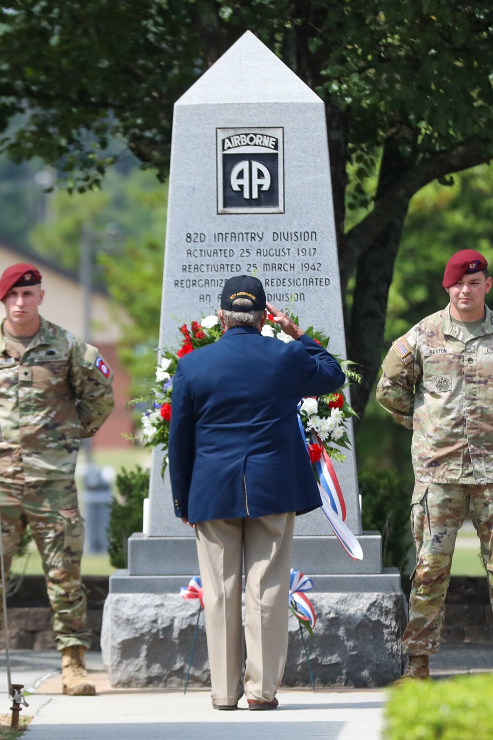 A veteran of the 82nd Airborne Division honors fallen service members during the All American Week memorial ceremony Tuesday on Fort Bragg.