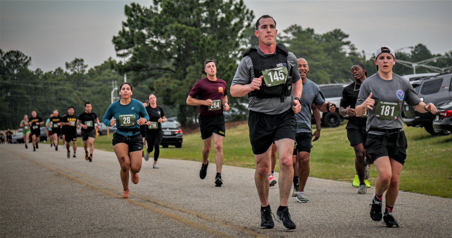 Paratroopers of the 82nd Airborne Division run the All American 10-Miler on Fort Bragg on Tuesday for. All American Week.