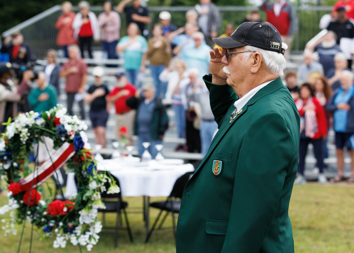 Don Talbot salutes during the Memorial Day ceremony at Freedom Memorial Park.