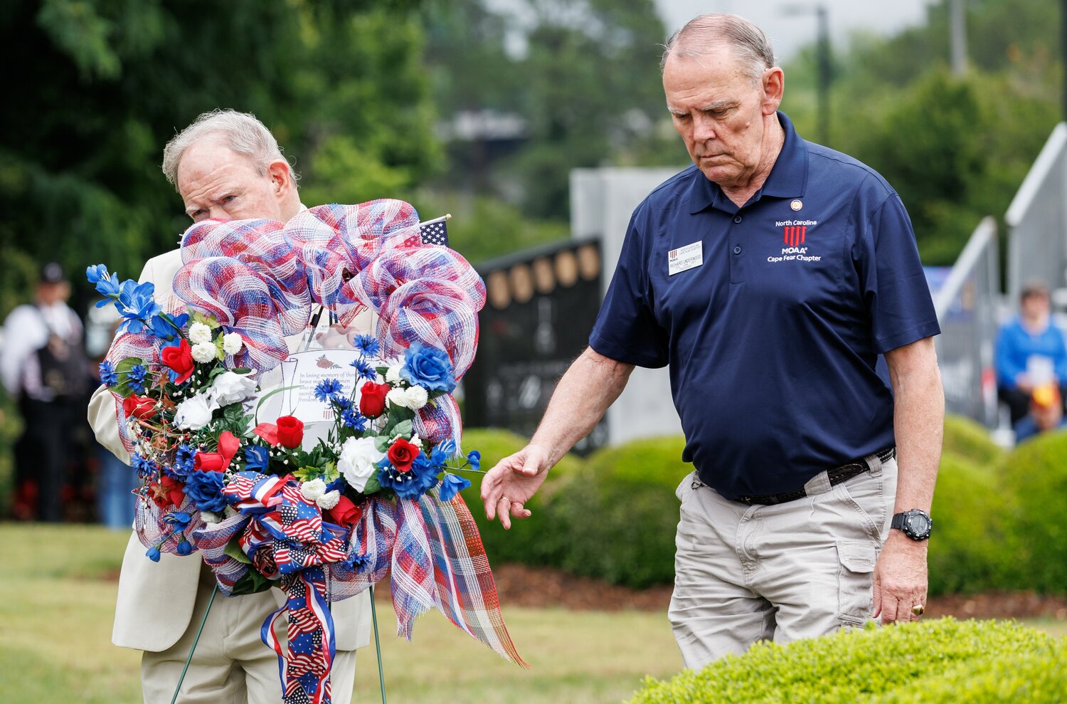 Wreaths are laid at monuments during the Memorial Day ceremony at Freedom Memorial Park.