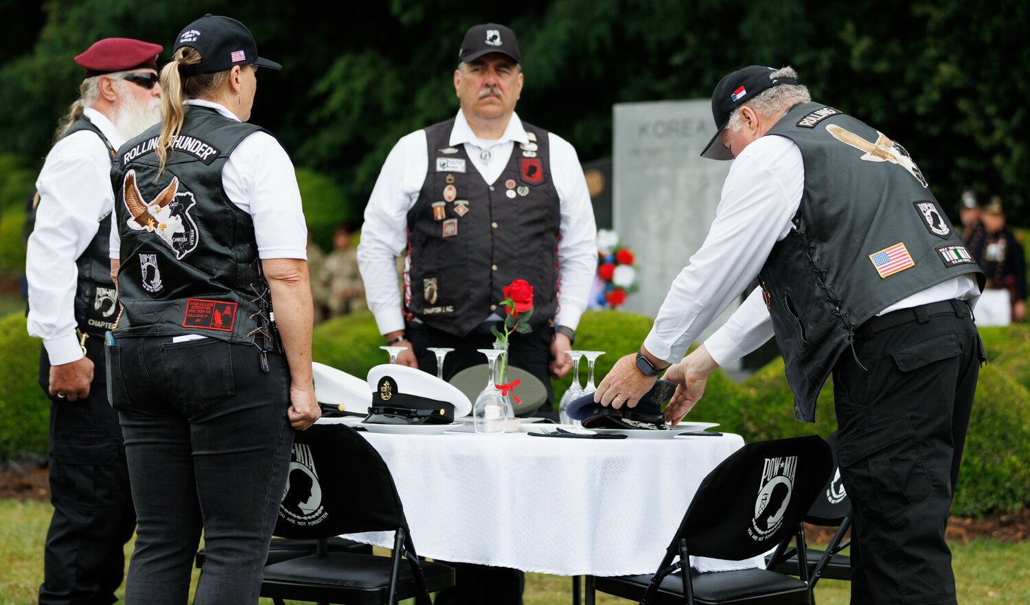 Rolling Thunder's 'missing man' table honors members of each service branch..