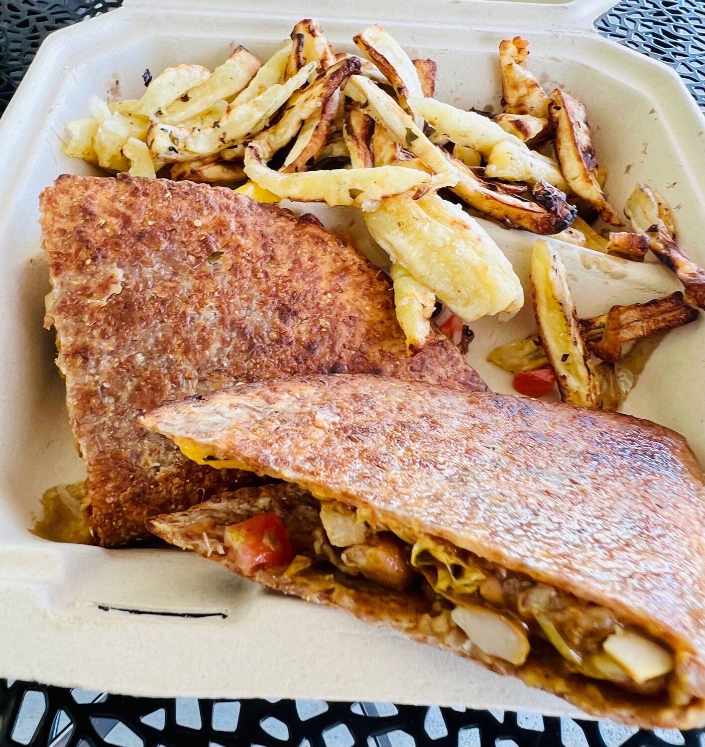 The Caribbean-inspired jackfruit quesadillas come with a side of burro banana fries at Earthhouse in Westwood Shopping Center.