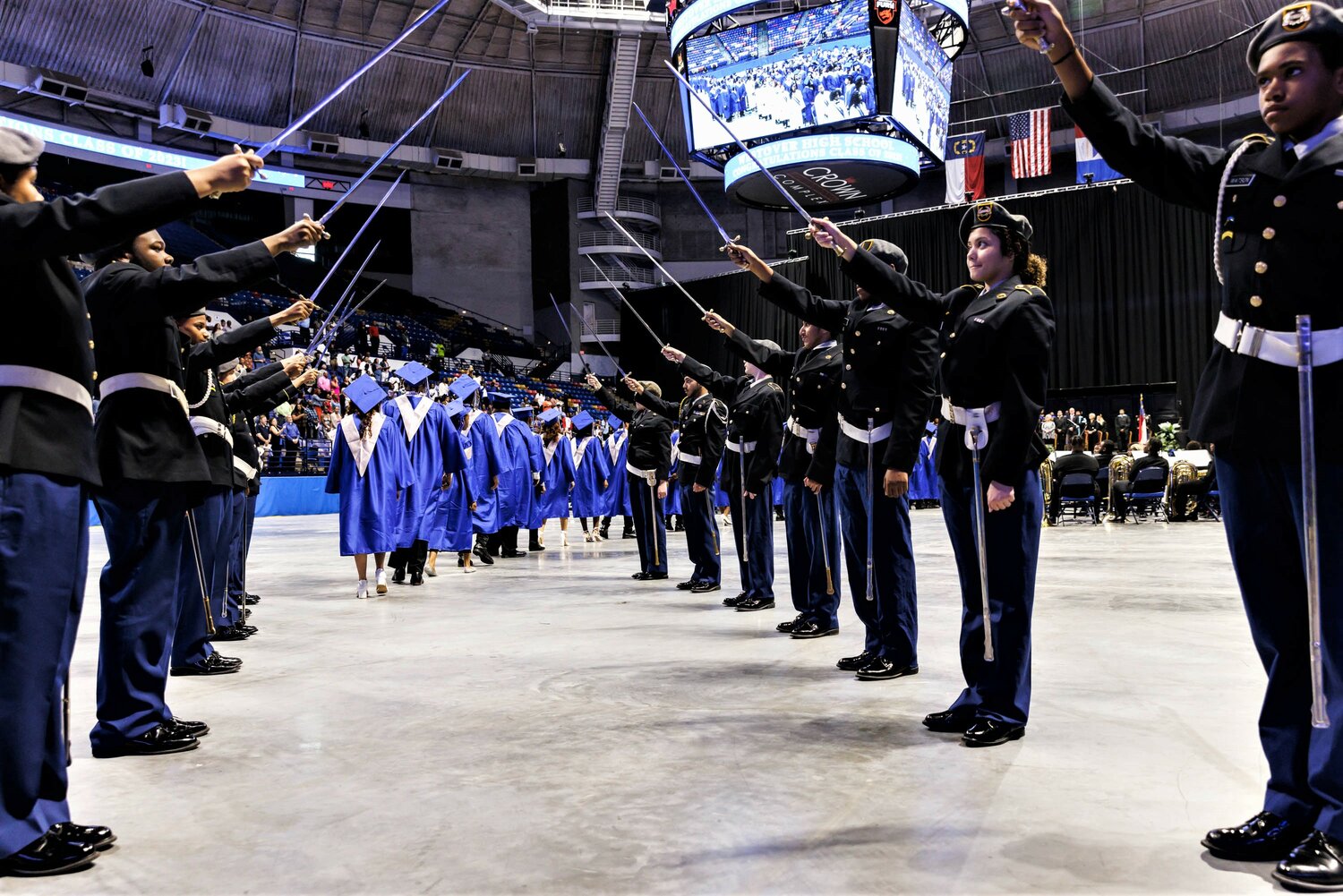 Cadets salute the graduates at Westover High School's 2023 commencement Tuesday at the Crown Coliseum.