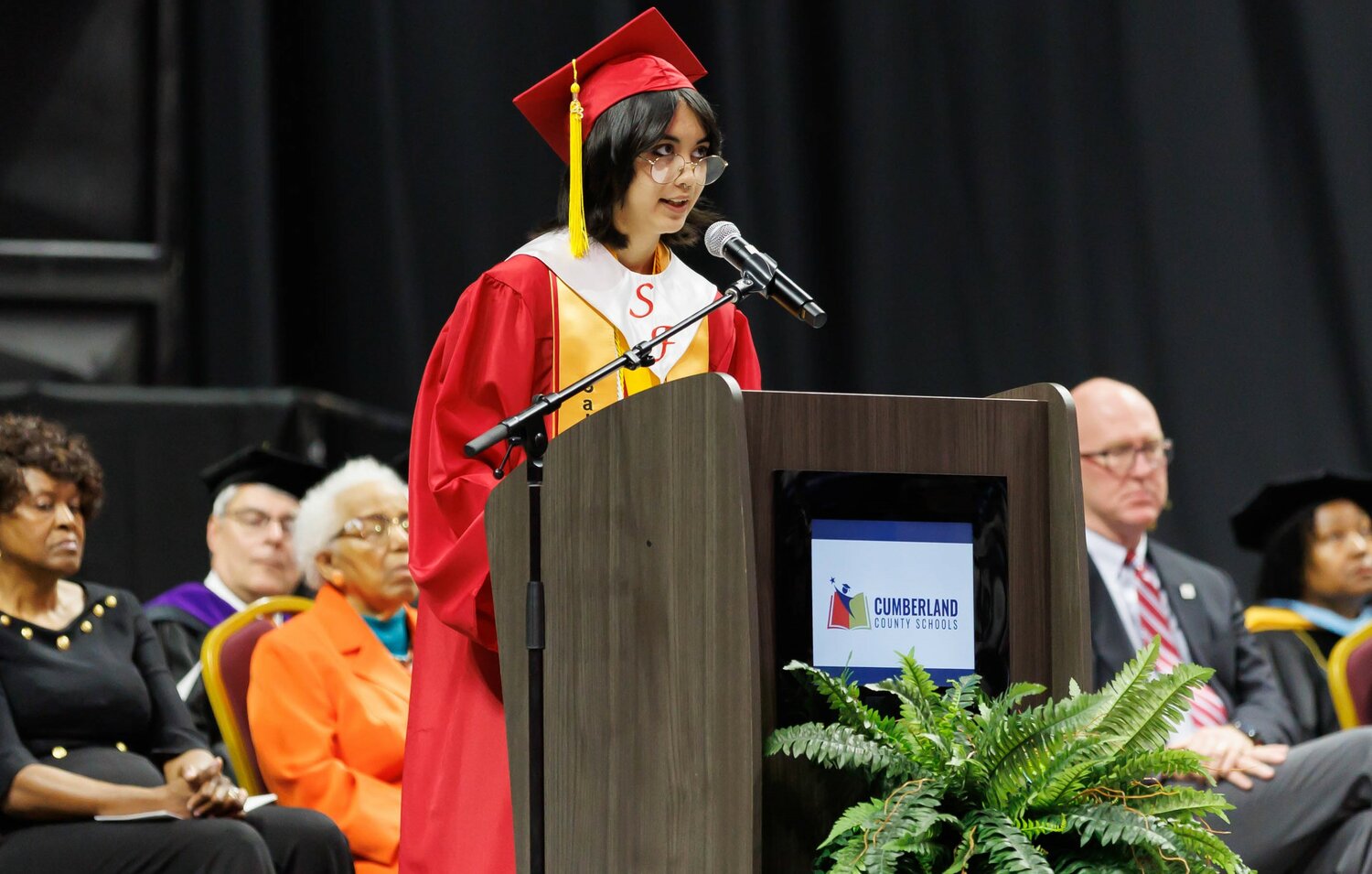 A graduate speaks during the 2023 commencement for Seventy-First High School on Tuesday at the Crown Coliseum.
