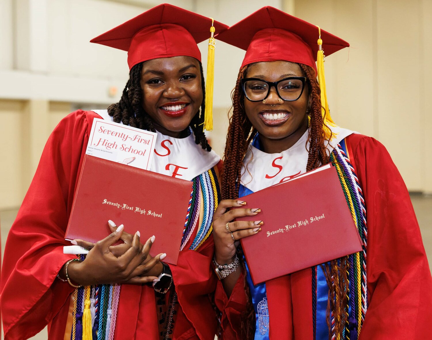 Graduates show off their diplomas at the 2023 commencement for Seventy-First High School was held on Tuesday at the Crown Coliseum.