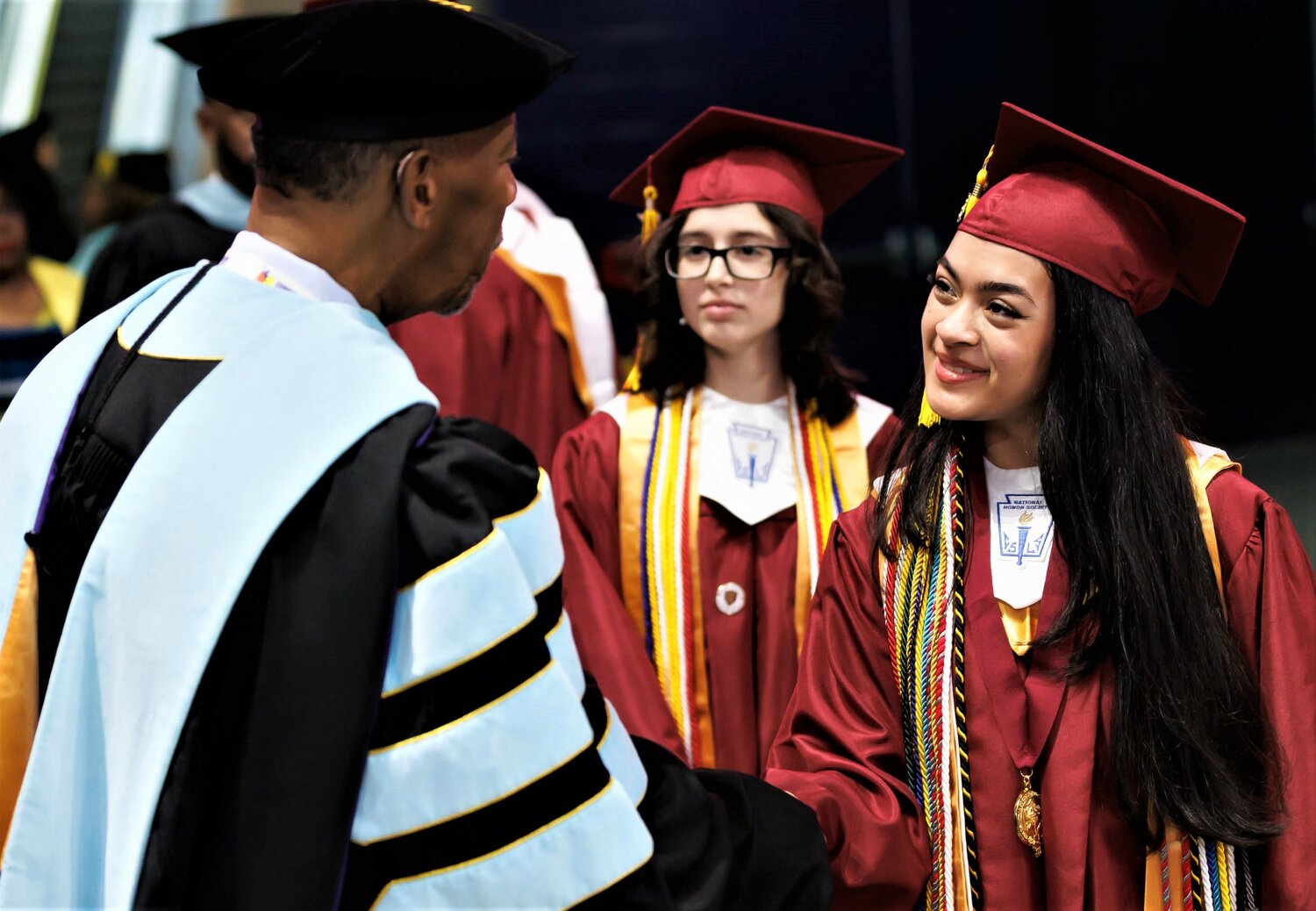 Cumberland County Superintendent Marvin Connelly Jr. congratulates a Douglas Byrd High School graduate during the 2023 commencement Wednesday at the Crown Coliseum.