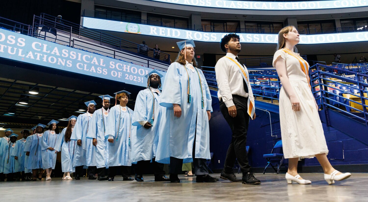 Graduates enter the Crown Coliseum on Wednesday for the 2023 commencement for Reid Ross Classical High School.