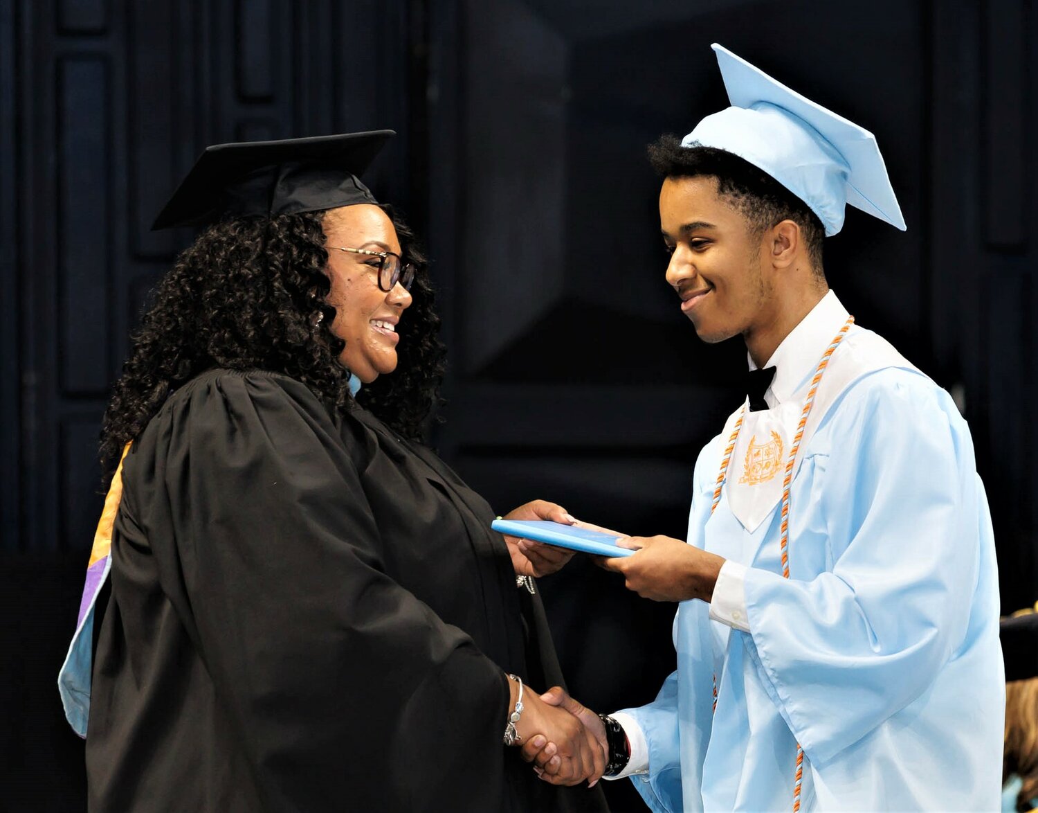 A graduate receives his diploma at the 2023 commencement for Reid Ross Classical High School was held at the Crown Coliseum on Wednesday.