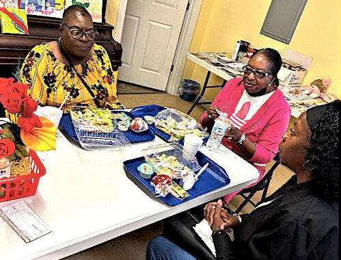 Residents of Hertford County enjoy a meal at the Murfreesboro Nutrition Center in May, where diners enjoy the company as well as healthy food. The North Carolina Senior Tar Heel Legislature has asked for millions in additional allocations for such programs in the state budget.