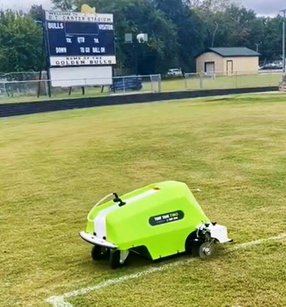The Turf Tank Two, which tackles the arduous task of lining athletic fields for play and turns it into a job for one person and one machine, is put to use at D.T. Carter Stadium at E.E. Smith High School.