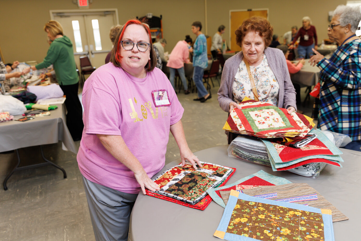Colleen Heacock uses her quilting skills to make placemats supporting Meals on Wheels over the holidays. Photo: Tony Wooten