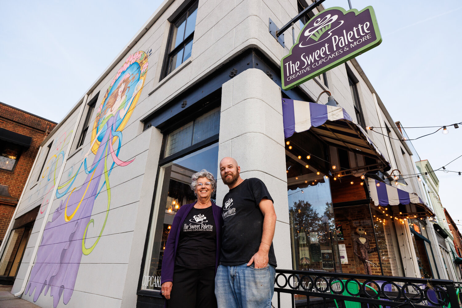In October and November 2023, Patsy Crawford and her son Adam Crawford added their artistic touch to the downtown atmosphere by painting a mural on the side of The Sweet Palette bakery. Patsy hopes the mural will draw more visitors to businesses on Person Street.
