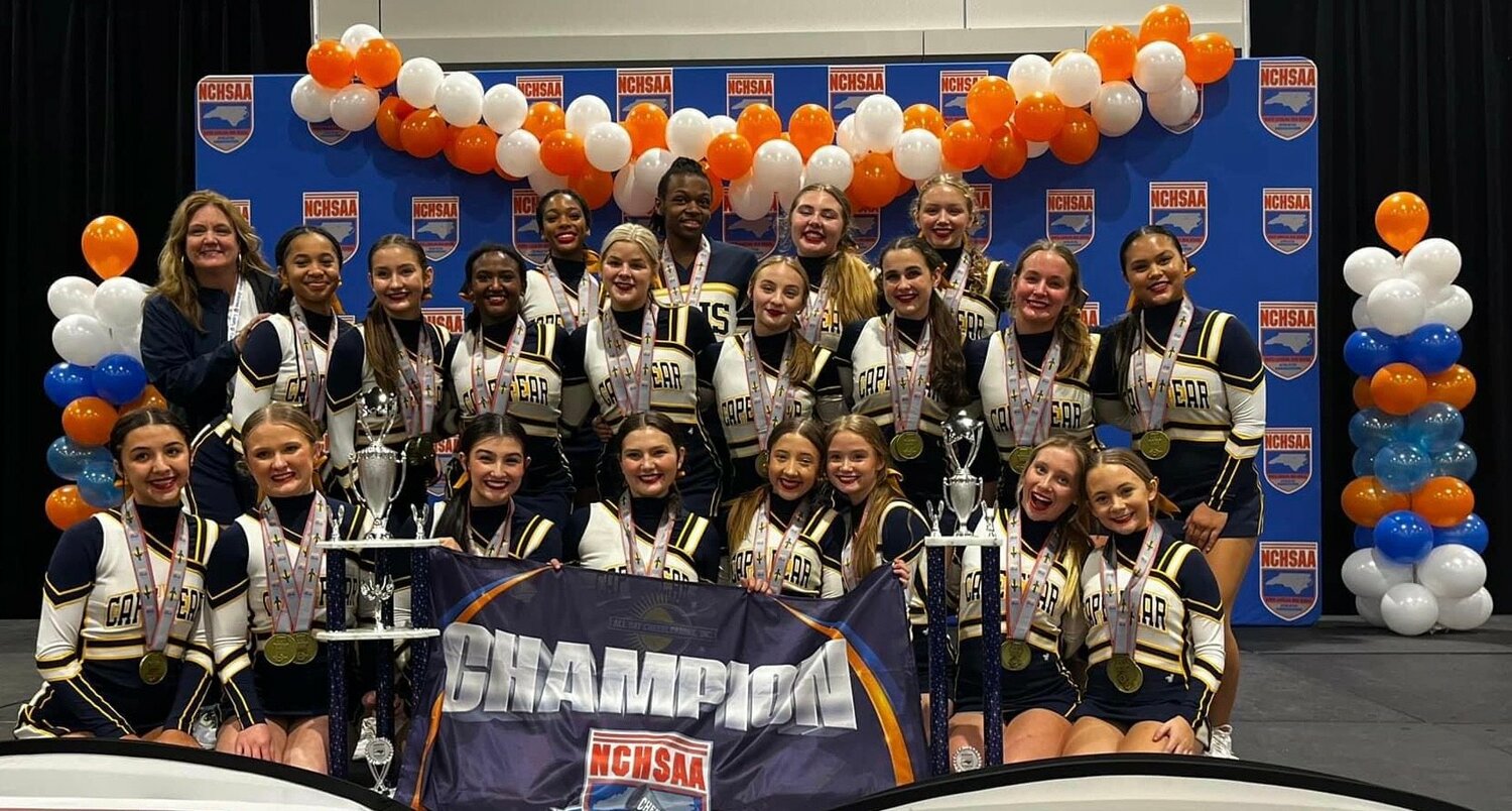 Cape Fear High School's cheerleaders enjoy their state performance cheer (coed, non-tumbling) title.