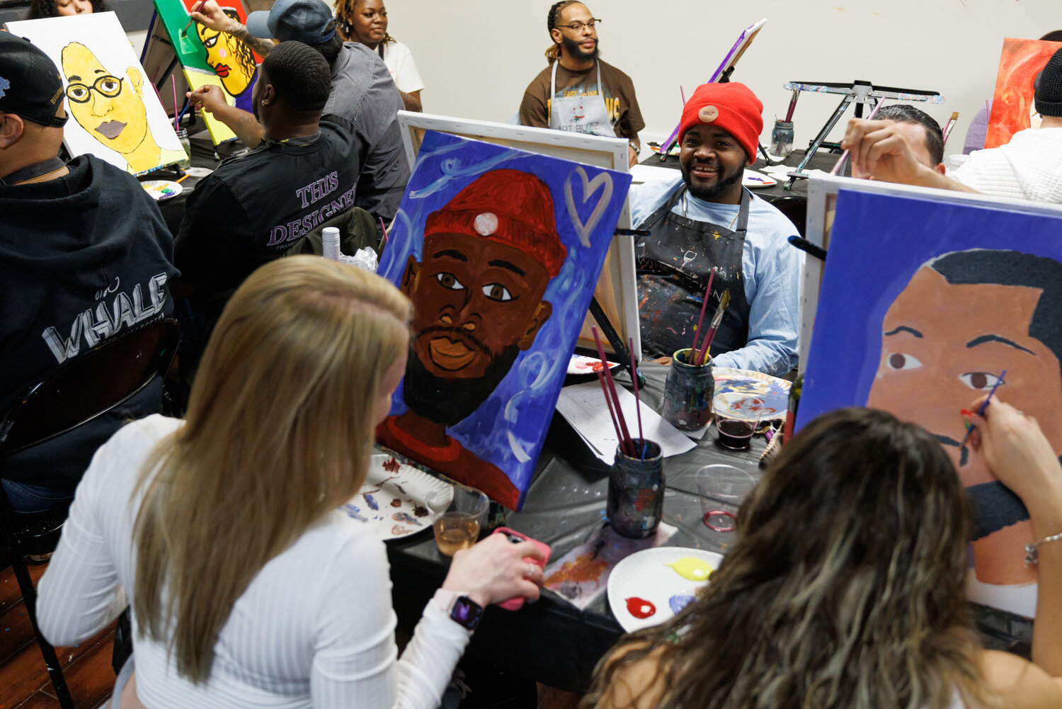 Stephanie Huckabee and Brandon Kirk have been together for years and decided to mix things up by attending Wine & Design Fayetteville's Date Night to paint portraits of each other.
