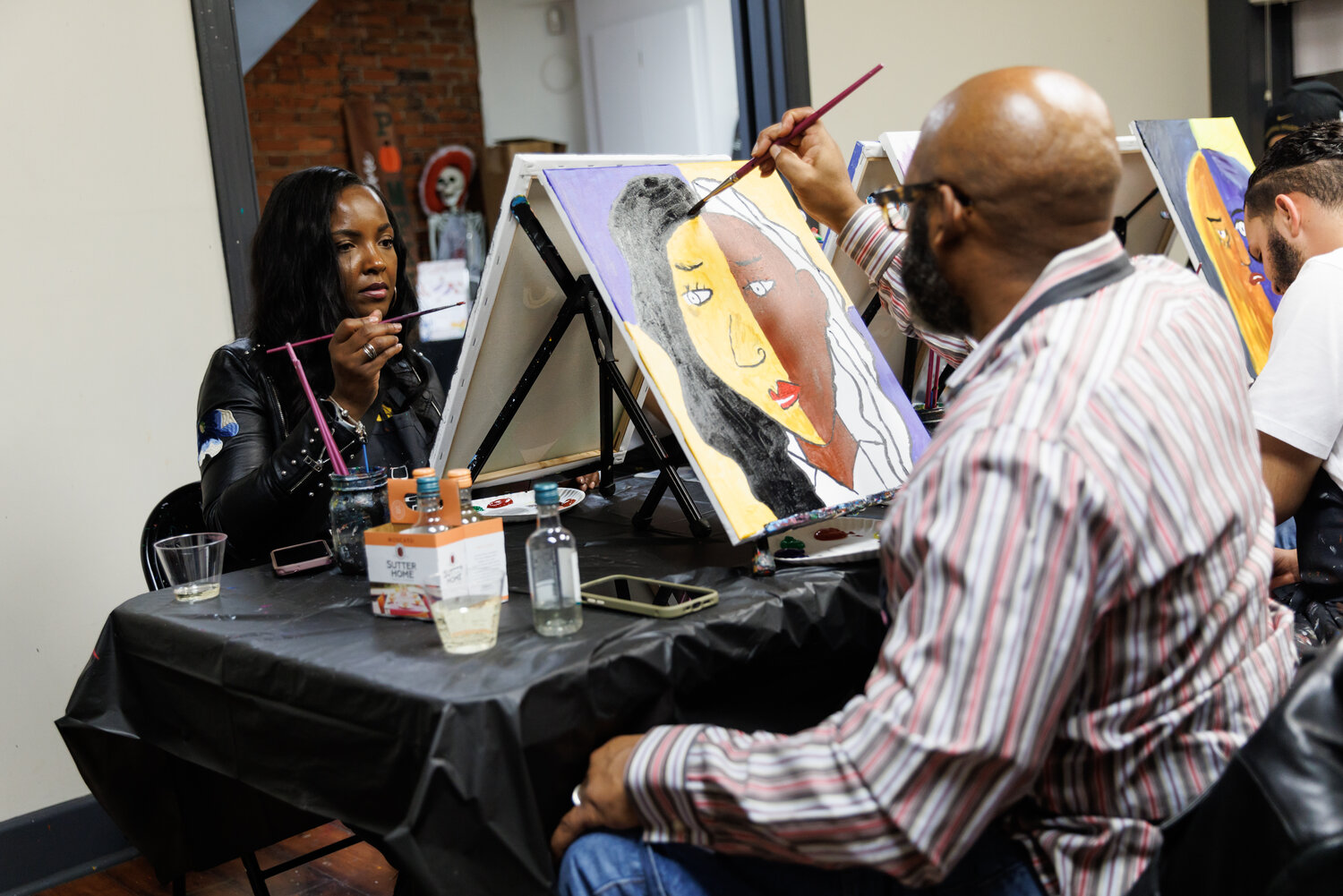 Ron and Tameeka Broadway have been married for 10 years and chose this evening to paint portraits of one another as an alternative to a dinner date.