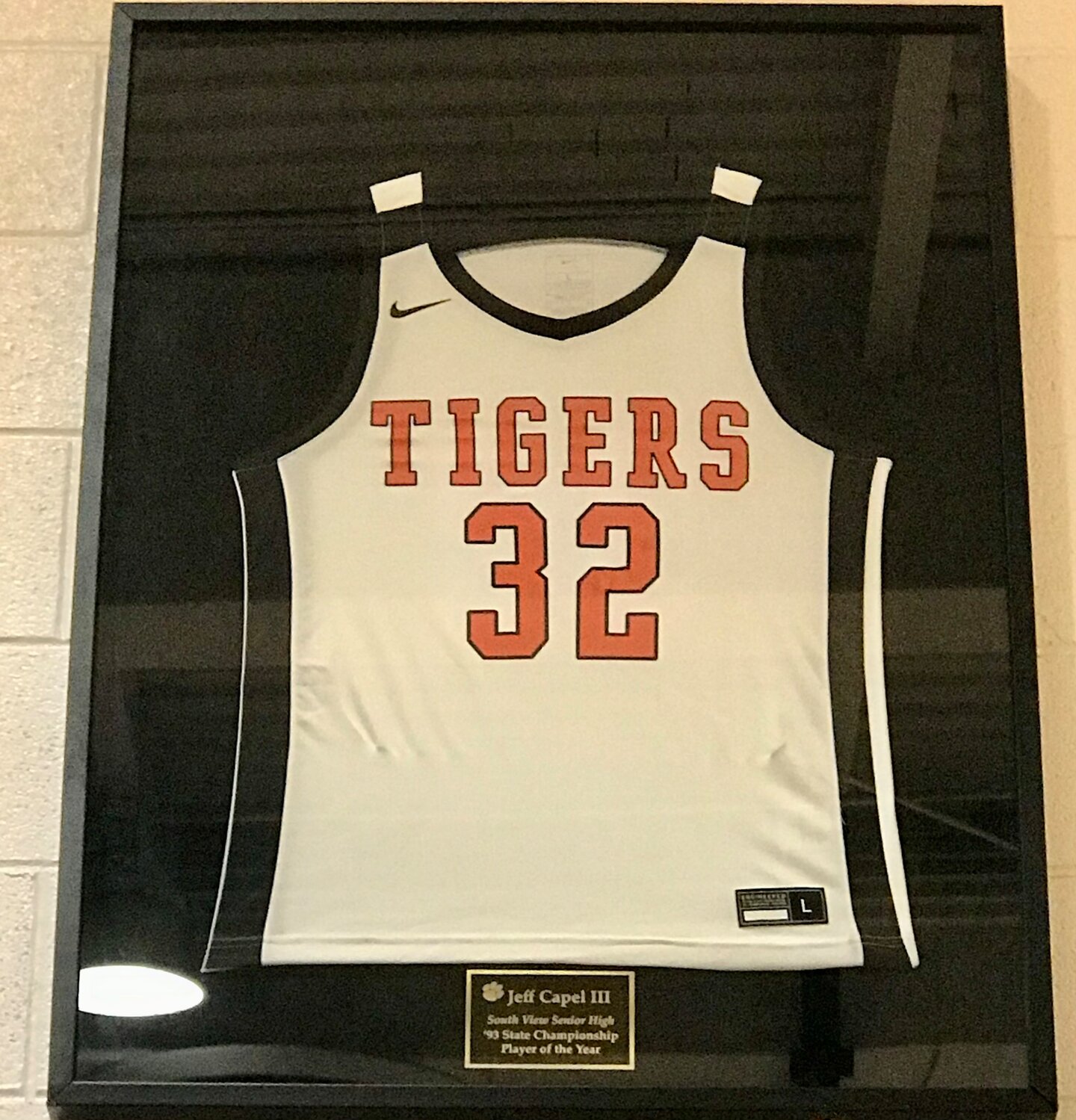 Jersey on Miller Gym wall.