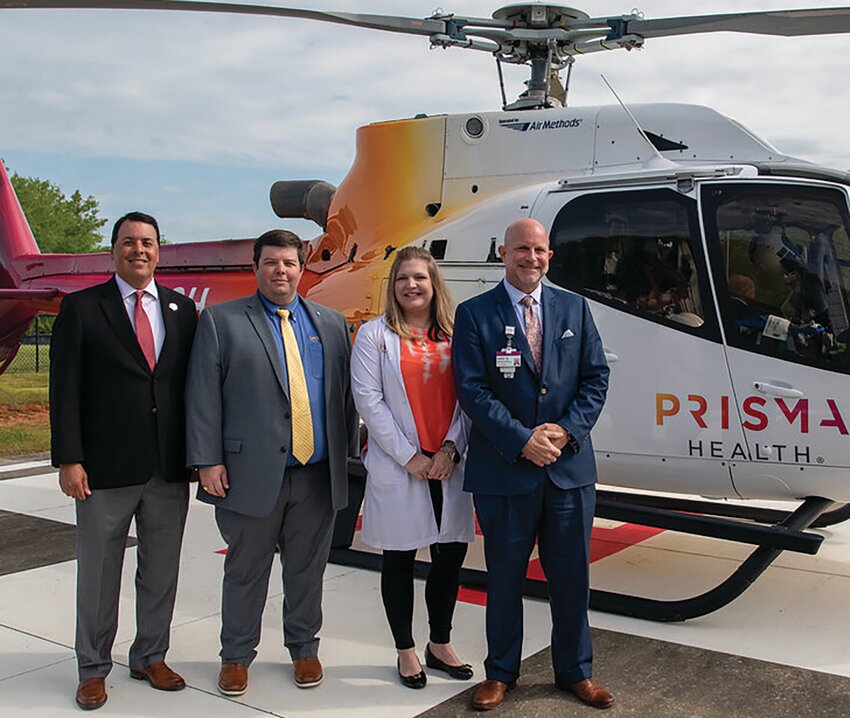 Justin Benfield, chief executive officer of Prisma Health’s Laurens County and Hillcrest Hospitals, far right, will deliver the keynote address at both ceremonies.