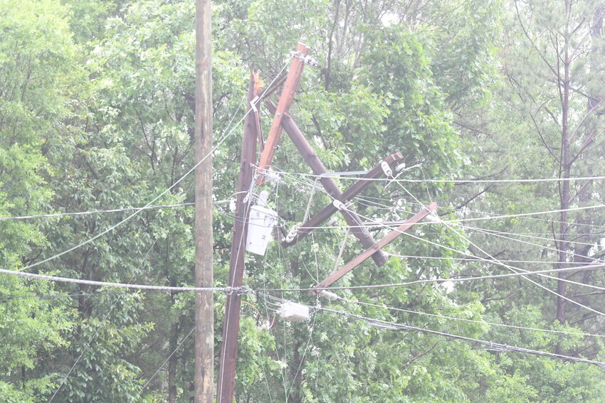 A storm cracked a utility pole early Thursday morning on Hwy 308 between Clinton and I-385