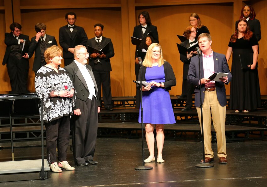 Dr. Judith Neufeld and Dr. Charles Neufeld were honored for their years of service at Lander University during the choral director’s final concert at the school April 14.  The Neufeld’s will retire May 1. Pictured with the couple are Dr. Sarah Hunt-Barron, dean of the College of Education (center) and Dr. Lucas McMillan, interim dean for the College of Arts and Humanities (right).