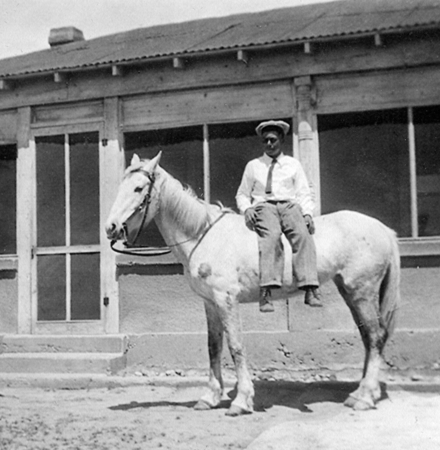 Jose Felipe “Lipe” Montoya "sitting" on his horse, c. 1940.