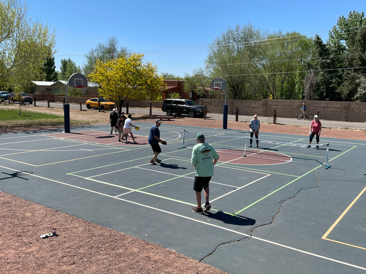 Adults played pickleball while kids played basketball during the recreation fair in Corrales on April 30. (T.S. Last/Corrales Comment)