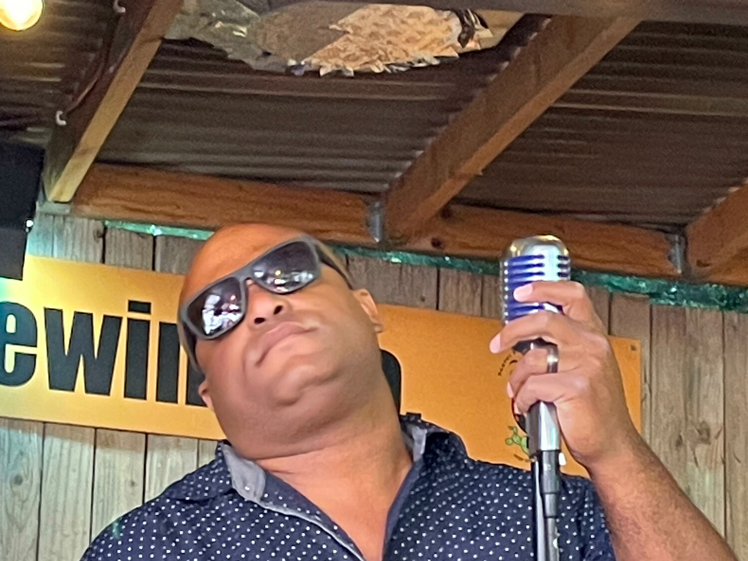 Michael Matison was feeling the blues on a recent Sunday afternoon at Kaktus Brewing in Bernalillo. The brewery is sponsoring a two-day music event June 17-18. (T.S. Last/Sandoval Signpost)