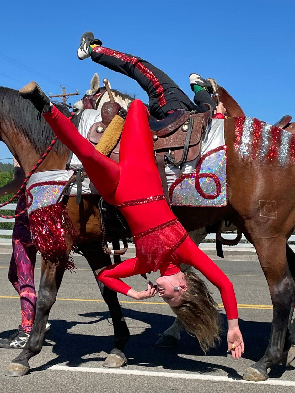 Kaitlyn Vollmer of Colorado's Shockwave Trick Riders had a different perspective of the Sandoval County Fair parade than most participants.