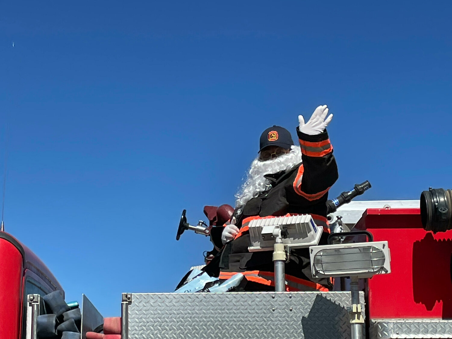 Is that Santa Claus atop a Sandoval County fire engine at the end of the Sandoval County Fair parade?