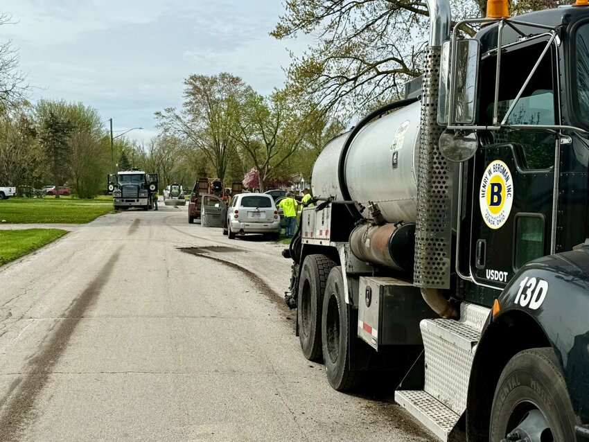 Work is being done on electrical poles around Walbridge.