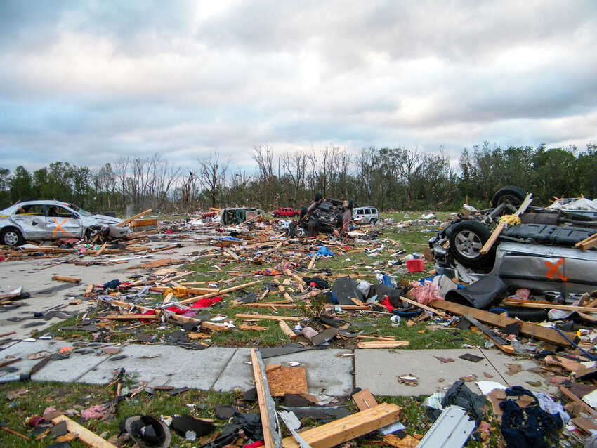 Damage to property and homes on Main Street in Millbury is shown in the early morning hours after the tornado struck.