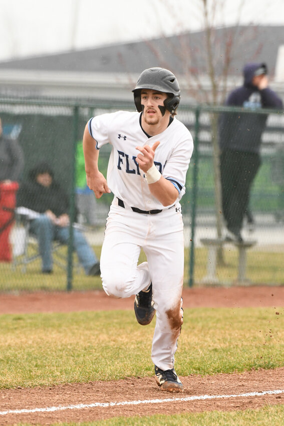 Lake's Gavin Kohlhofer sprints home in a game against Stritch on March 29, 2025.