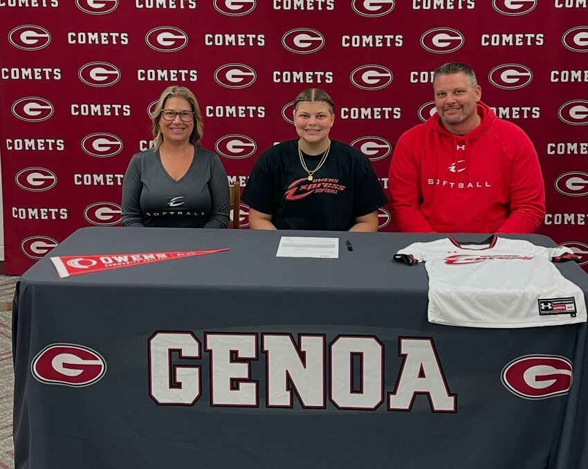 Genoa's Madelyn Bronowski is pictured with her parents after signing with the Owens softball program.
