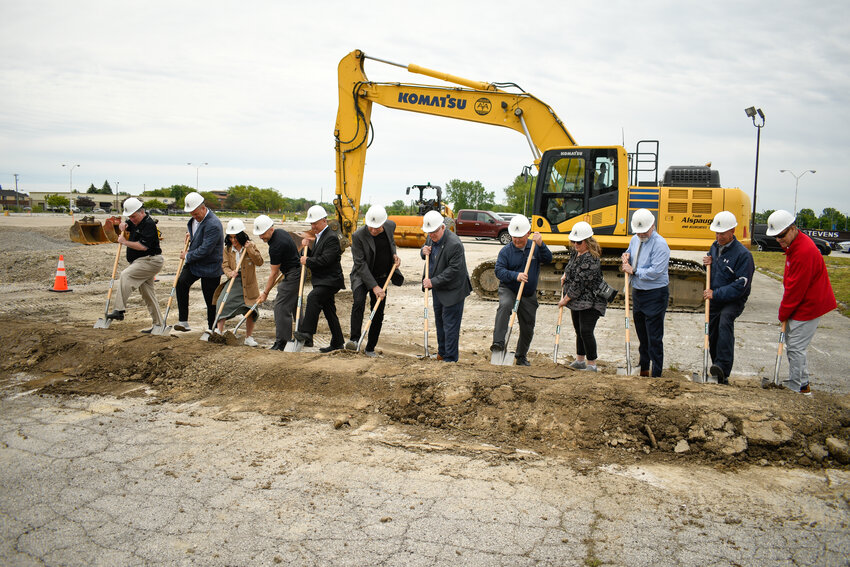 City officials and local developers celebrate the groundbreaking for the Oregon Town Center.