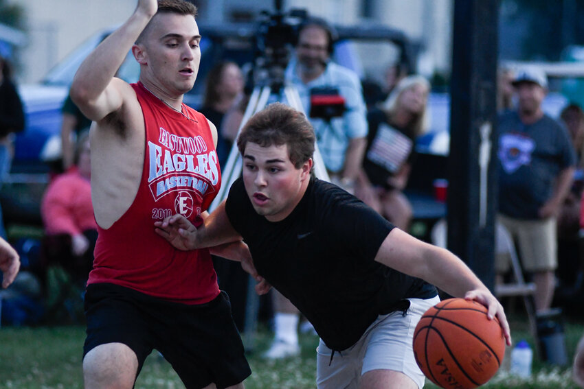 Players compete during the playoffs of the inaugural season of Monday Night Lights on July 22, 2024 at Memorial Park in Pemberville.